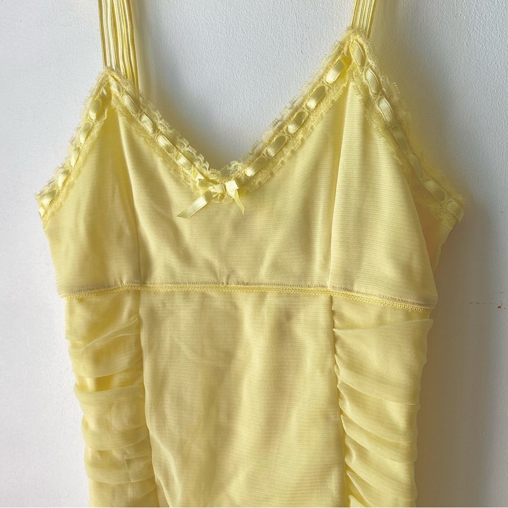 Vintage Y2k yellow women’s tank top camisole with lace trim and mesh fabric